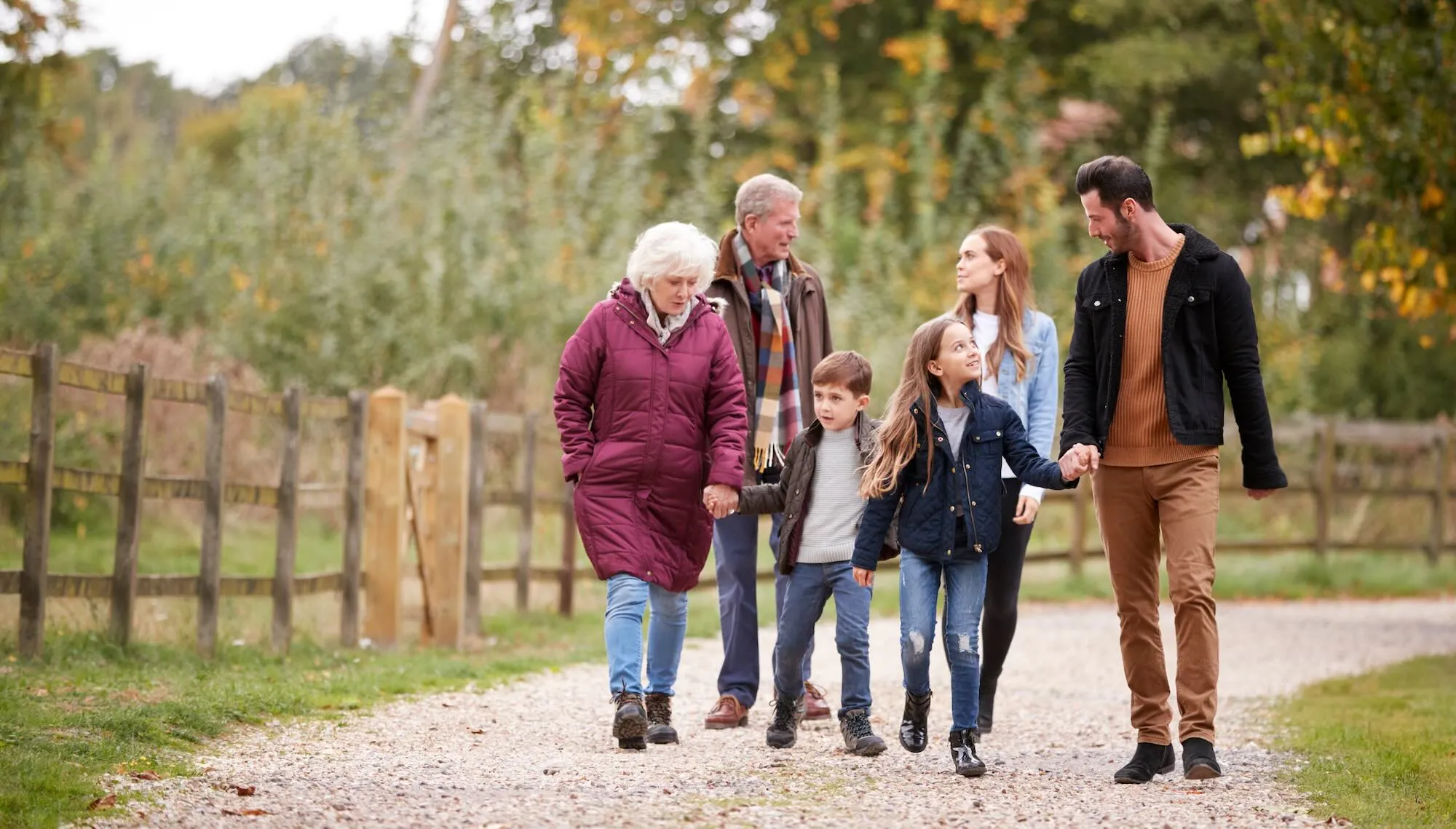 happy family together with their grandparents